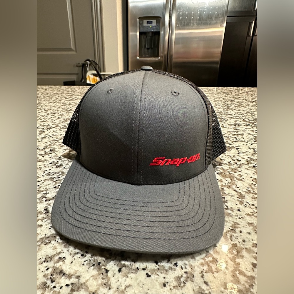 Snap on snapback
